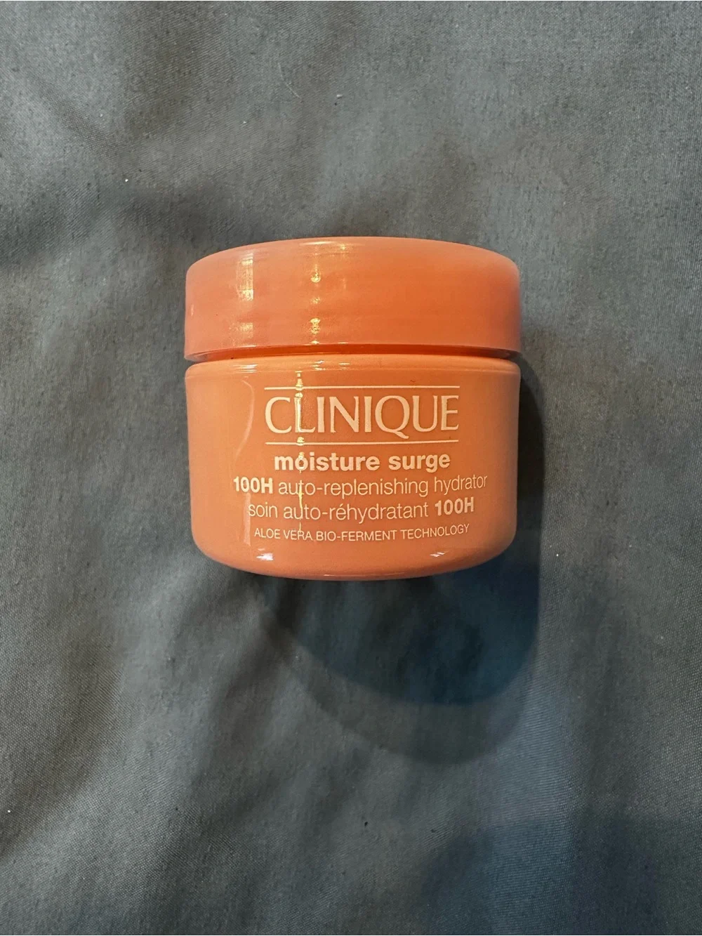 Clinique Moisture Surge 100H Hydrator — Coral Orange Jar